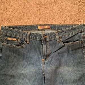 Size 17 LeI jeans. Some fading across the left side of the butt